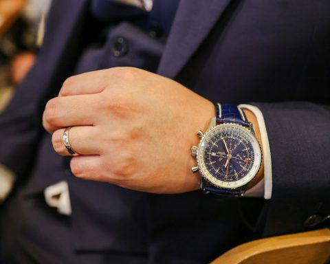 a close up of a person wearing a watch