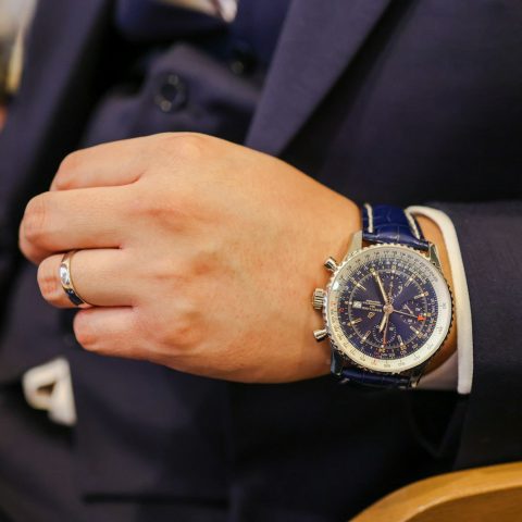 a close up of a person wearing a watch