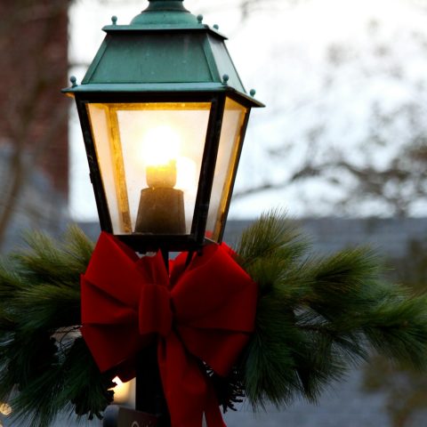 red and black metal lantern lighted