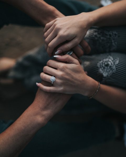 man and woman holding each others hands