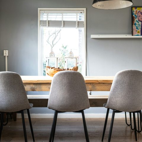 brown wooden table and chairs