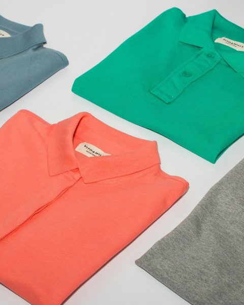green crew neck shirt and gray crew neck shirt