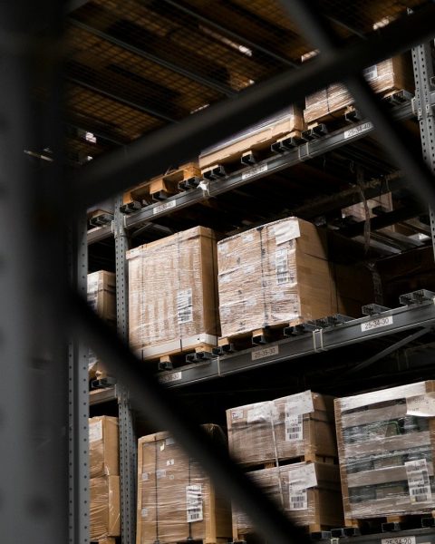 a warehouse filled with lots of boxes and pallets